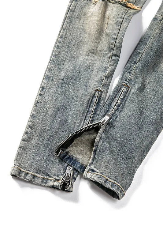 Shatter Fade Zippered Destroyed Jeans – Light Blue Ripped Streetwear Denim, Inner Zipper Detail, GOAT Streetwear Essentials