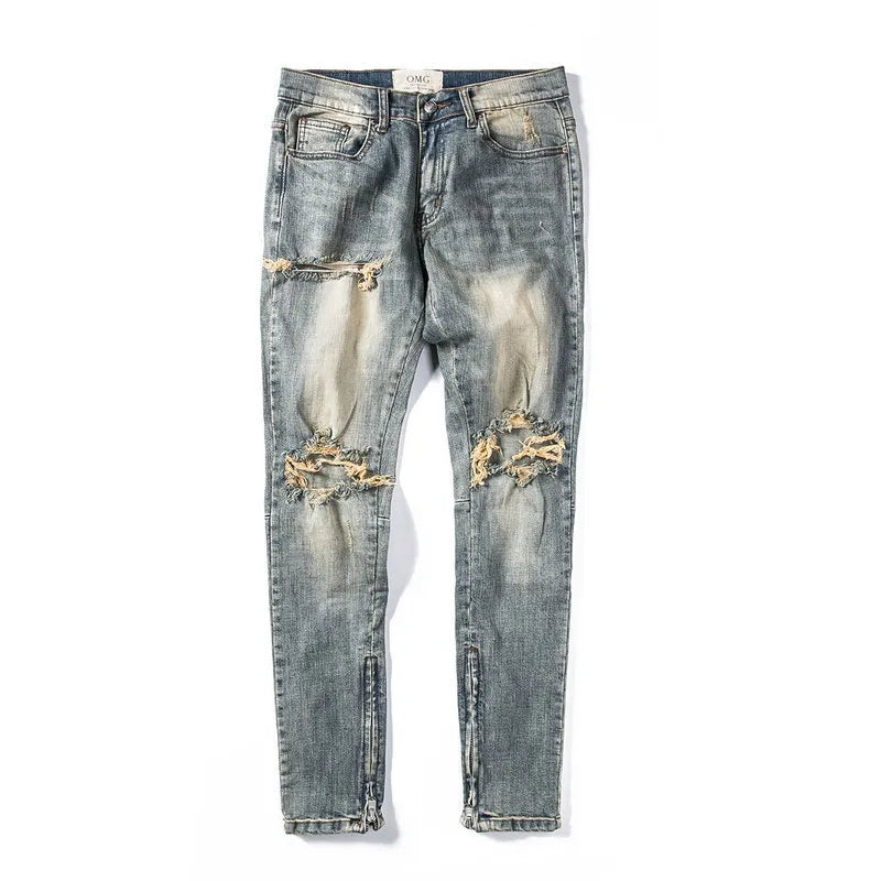 Shatter Fade Zippered Destroyed Jeans – Light Blue Ripped Streetwear Denim, Inner Zipper Detail, GOAT Streetwear Essentials