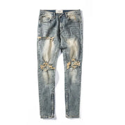 Shatter Fade Zippered Destroyed Jeans – Light Blue Ripped Streetwear Denim, Inner Zipper Detail, GOAT Streetwear Essentials
