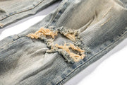 Shatter Fade Zippered Destroyed Jeans – Light Blue Ripped Streetwear Denim, Inner Zipper Detail, GOAT Streetwear Essentials